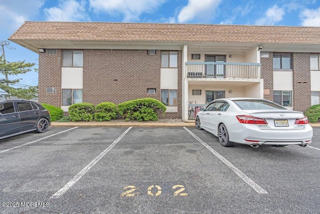 1320 State Route 71 Unit 202, Belmar, NJ 07719 - view of property featuring uncovered parking