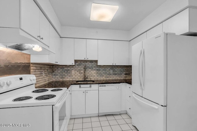 1320 State Route 71 Unit 202, Belmar, NJ 07719 - kitchen featuring white appliances, a sink, white cabinets, dark countertops, and decorative backsplash