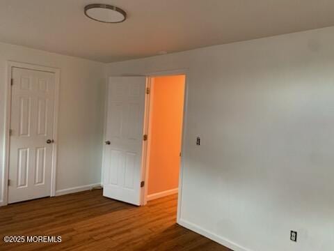 128 Hamilton Ave, Seaside Heights, NJ 08751 - unfurnished bedroom featuring baseboards and wood finished floors