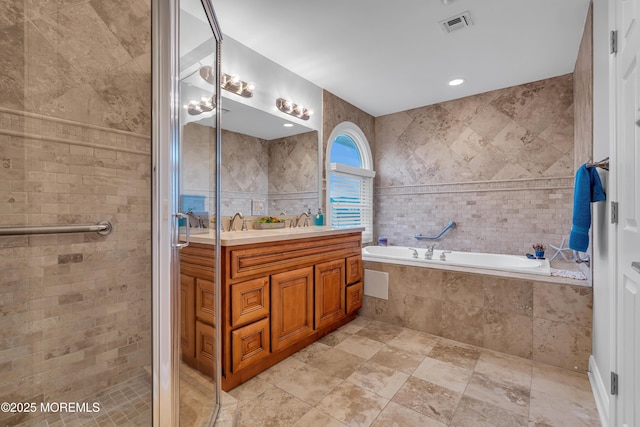 21 Blaine Ave Unit 10, Seaside Heights, NJ 08751 - full bath with tile walls, vanity, a bath, and a shower stall