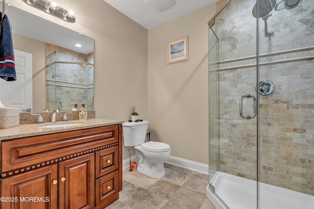 21 Blaine Ave Unit 10, Seaside Heights, NJ 08751 - full bathroom with baseboards, vanity, toilet, and a shower stall