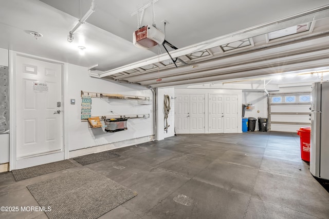 21 Blaine Ave Unit 10, Seaside Heights, NJ 08751 - garage with a garage door opener and freestanding refrigerator