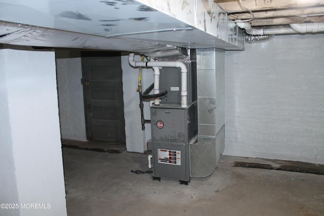 519 Roosevelt Ave, Carteret, NJ 07008 - unfinished basement with heating unit and concrete block wall