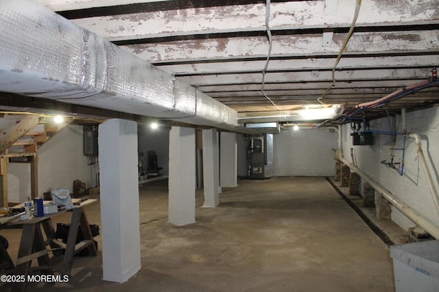519 Roosevelt Ave, Carteret, NJ 07008 - unfinished basement featuring heating unit, gas meter, and electric panel