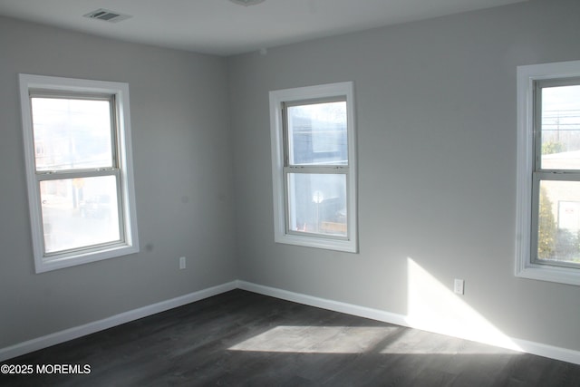 519 Roosevelt Ave, Carteret, NJ 07008 - empty room featuring dark wood-type flooring and baseboards