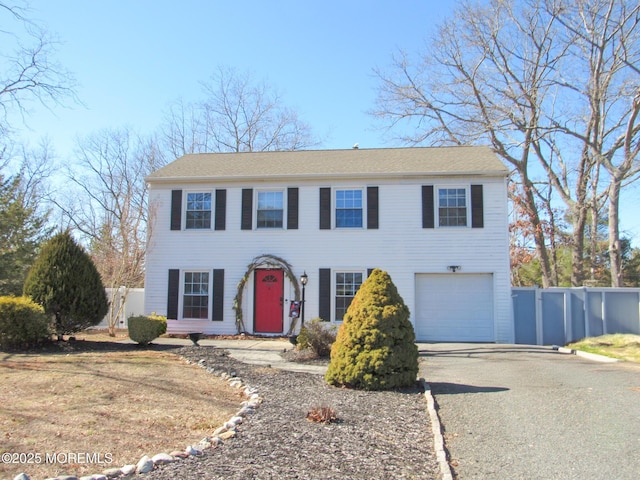 5 Highland Dr, Barnegat, NJ 08005 - colonial house featuring a garage and asphalt driveway
