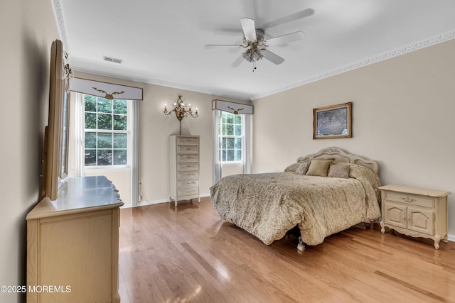 25 Bellflower Dr, Lakewood, NJ 08701 - bedroom with ornamental molding, light wood-style flooring, baseboards, and ceiling fan
