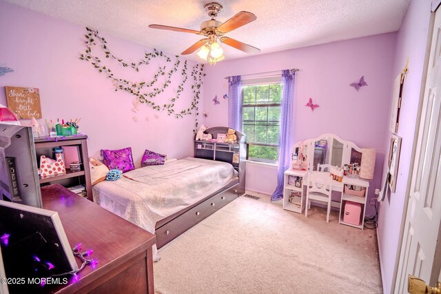 25 Atlantis Ter, Freehold, NJ 07728 - carpeted bedroom with a textured ceiling and ceiling fan
