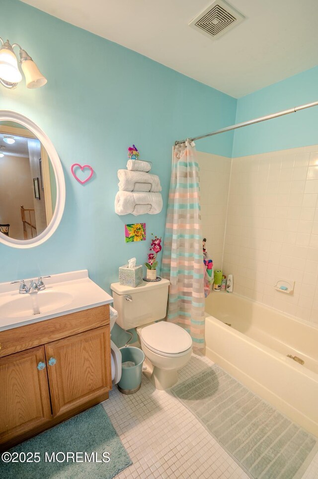 25 Atlantis Ter, Freehold, NJ 07728 - bathroom with shower / tub combo, toilet, vanity, and tile patterned floors
