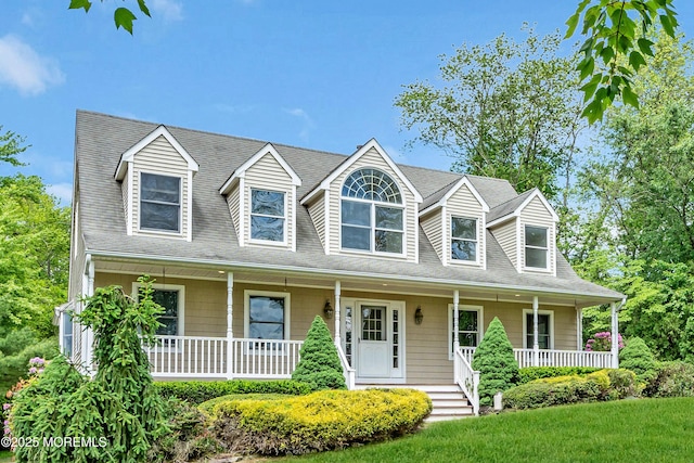 668 Hyson Rd, Jackson, NJ 08527 - cape cod house featuring covered porch, a shingled roof, and a front yard