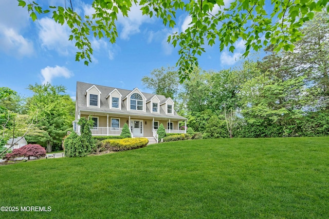 668 Hyson Rd, Jackson, NJ 08527 - new england style home with a front lawn and a porch