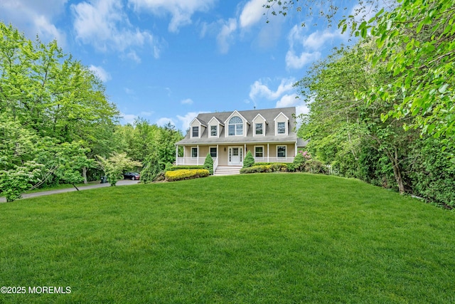 668 Hyson Rd, Jackson, NJ 08527 - cape cod-style house with covered porch and a front lawn