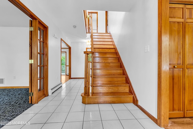 668 Hyson Rd, Jackson, NJ 08527 - stairs featuring tile patterned floors, baseboard heating, and baseboards