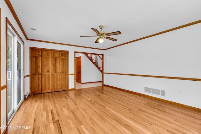 668 Hyson Rd, Jackson, NJ 08527 - unfurnished bedroom featuring light wood finished floors, baseboards, ornamental molding, and ceiling fan