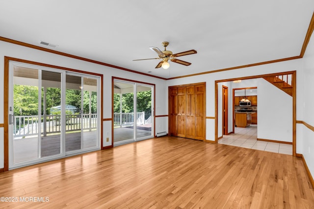 668 Hyson Rd, Jackson, NJ 08527 - unfurnished room featuring light wood-style flooring, ornamental molding, a ceiling fan, baseboard heating, and baseboards