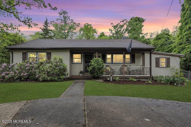 24 Delaware Trl, Browns Mills, NJ 08015 - ranch-style house featuring a porch and a front lawn