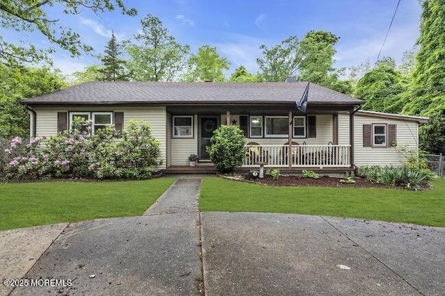24 Delaware Trl, Browns Mills, NJ 08015 - single story home with covered porch and a front lawn