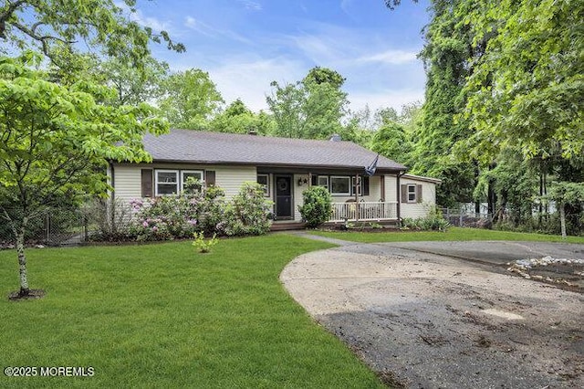 24 Delaware Trl, Browns Mills, NJ 08015 - ranch-style house with a porch and a chimney