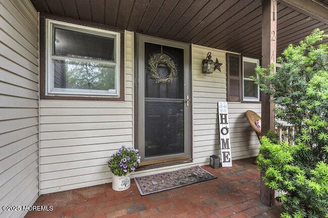 24 Delaware Trl, Browns Mills, NJ 08015 - view of exterior entry featuring covered porch
