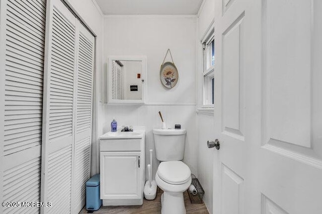 24 Delaware Trl, Browns Mills, NJ 08015 - bathroom with a closet, toilet, vanity, crown molding, and wood finished floors
