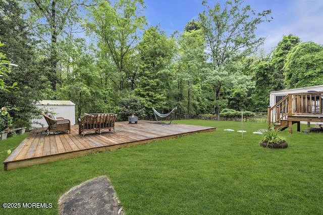 24 Delaware Trl, Browns Mills, NJ 08015 - view of green lawn with a deck