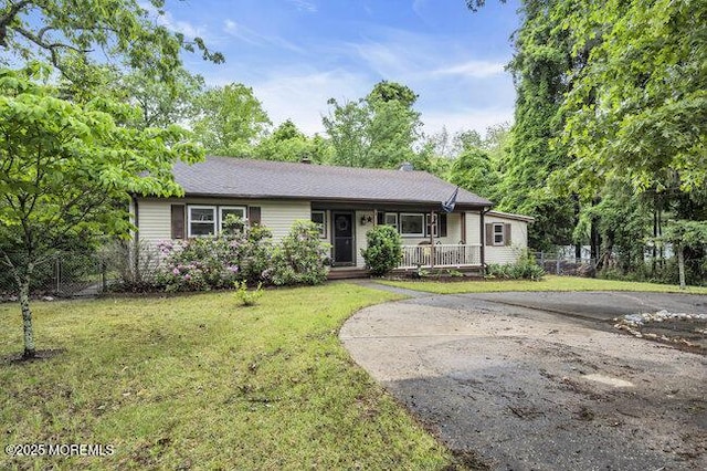 24 Delaware Trl, Browns Mills, NJ 08015 - ranch-style home with a porch and driveway