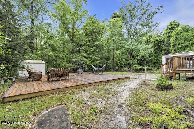 24 Delaware Trl, Browns Mills, NJ 08015 - wooden deck featuring a view of trees