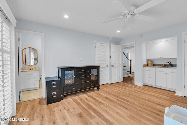 332 Seaview Cir, Neptune Township, NJ 07753 - bedroom with light wood-type flooring, recessed lighting, connected bathroom, a sink, and a ceiling fan