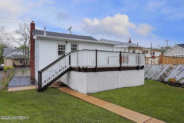 126 Seabreeze Ave, North Middletown, NJ 07748 - back of property featuring a wooden deck, stairway, and a chimney