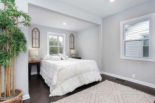 126 Seabreeze Ave, North Middletown, NJ 07748 - bedroom with dark wood-type flooring, baseboards, and recessed lighting
