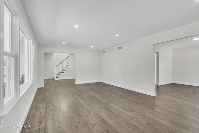 18 Heritage Dr, Edison, NJ 08820 - unfurnished room featuring stairway, dark wood finished floors, baseboards, and recessed lighting