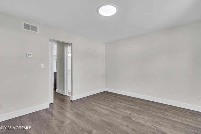 18 Heritage Dr, Edison, NJ 08820 - unfurnished room featuring dark wood-style floors and baseboards