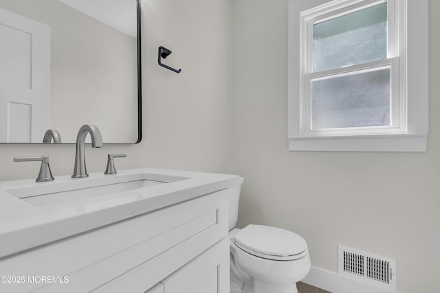18 Heritage Dr, Edison, NJ 08820 - bathroom with vanity, toilet, and baseboards