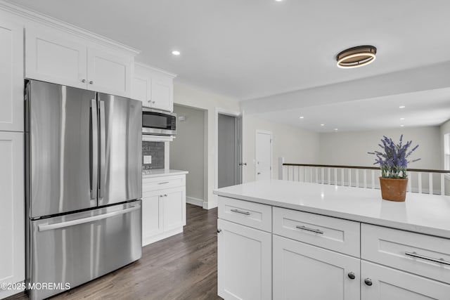 18 Heritage Dr, Edison, NJ 08820 - kitchen featuring appliances with stainless steel finishes, white cabinetry, dark wood-style floors, light countertops, and recessed lighting