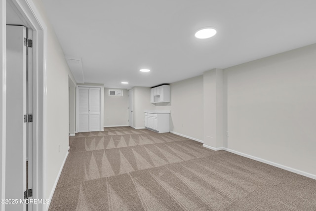 18 Heritage Dr, Edison, NJ 08820 - finished below grade area featuring light colored carpet, baseboards, and recessed lighting