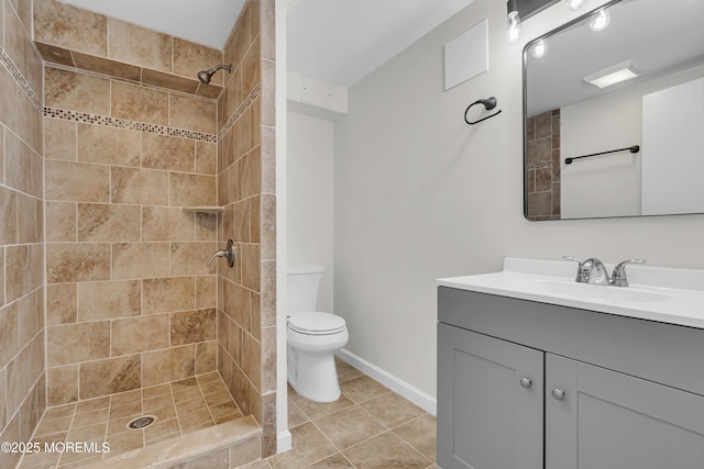 18 Heritage Dr, Edison, NJ 08820 - bathroom featuring vanity, tiled shower, toilet, and tile patterned floors