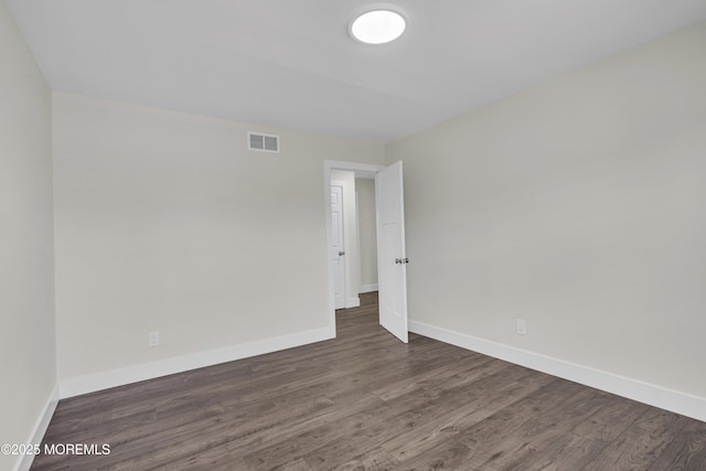 18 Heritage Dr, Edison, NJ 08820 - empty room with wood finished floors and baseboards