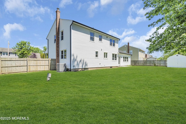 18 Heritage Dr, Edison, NJ 08820 - back of property with central air condition unit and a chimney
