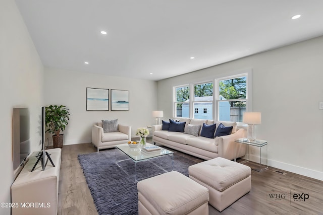 18 Heritage Dr, Edison, NJ 08820 - living room with wood finished floors, baseboards, and recessed lighting