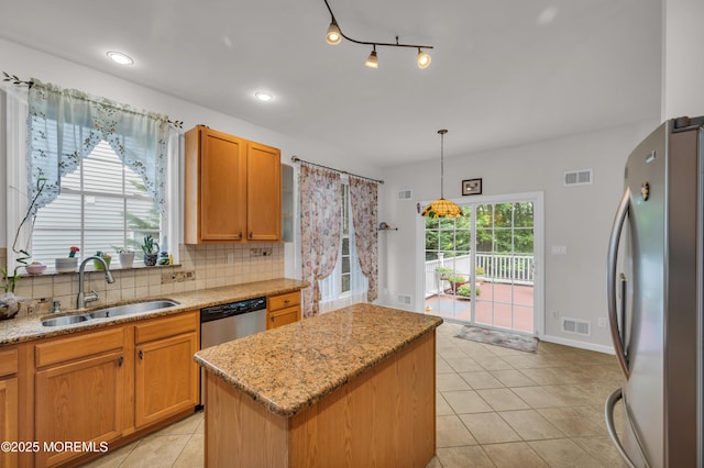208 Bradwick Way, Marlboro, NJ 07746 - kitchen with stainless steel appliances, a sink, backsplash, light tile patterned flooring, and a kitchen island