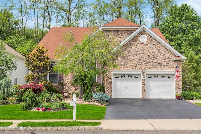 208 Bradwick Way, Marlboro, NJ 07746 - view of front facade featuring stone siding, driveway, a garage, and a front yard