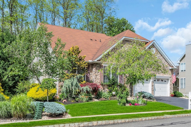 208 Bradwick Way, Marlboro, NJ 07746 - view of front of property with stone siding, driveway, an attached garage, and a front lawn