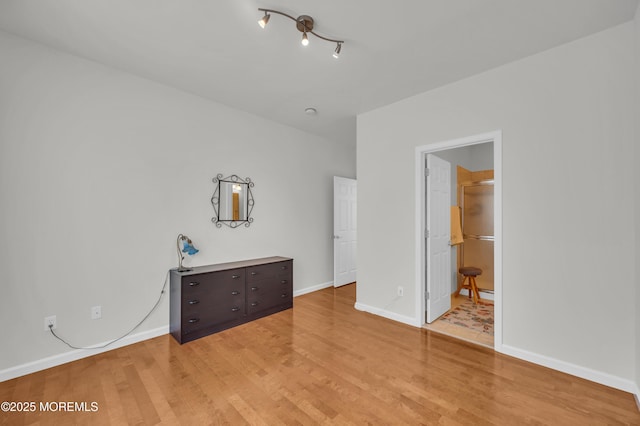 208 Bradwick Way, Marlboro, NJ 07746 - unfurnished bedroom with light wood-type flooring and baseboards