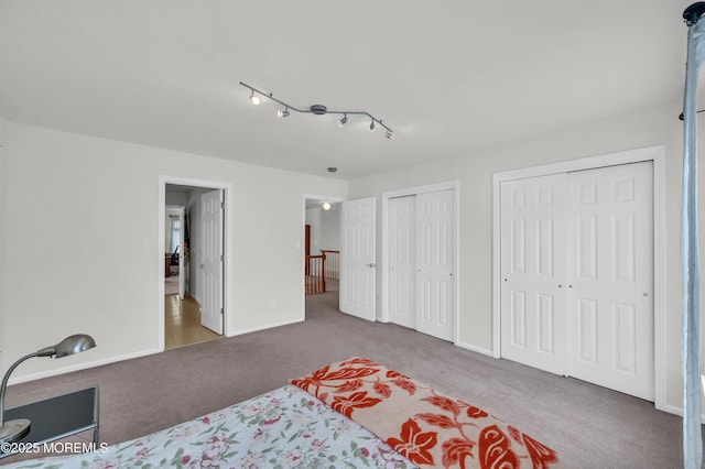 208 Bradwick Way, Marlboro, NJ 07746 - carpeted bedroom with multiple closets and baseboards