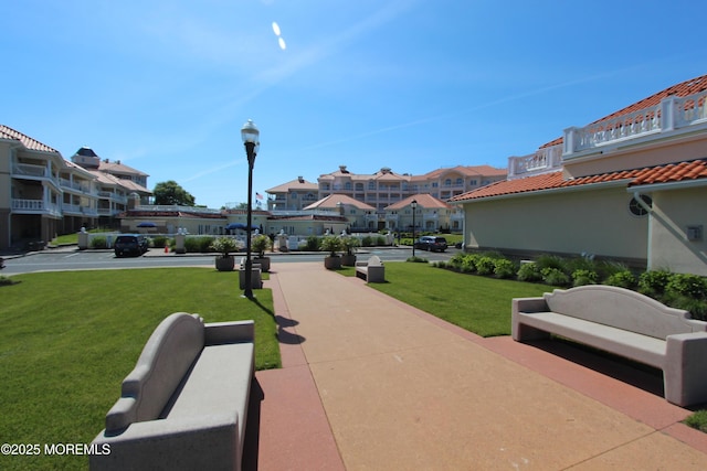 17 Riviera Dr, Long Branch, NJ 07740 - surrounding community featuring a residential view, a lawn, and outdoor lounge area
