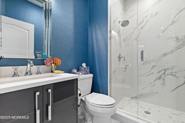 17 Riviera Dr, Long Branch, NJ 07740 - full bathroom with toilet, a marble finish shower, vanity, and a textured wall