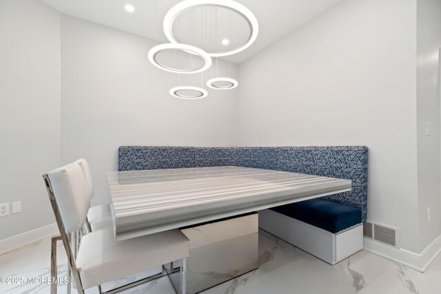 17 Riviera Dr, Long Branch, NJ 07740 - dining room with marble finish floors, baseboards, and recessed lighting