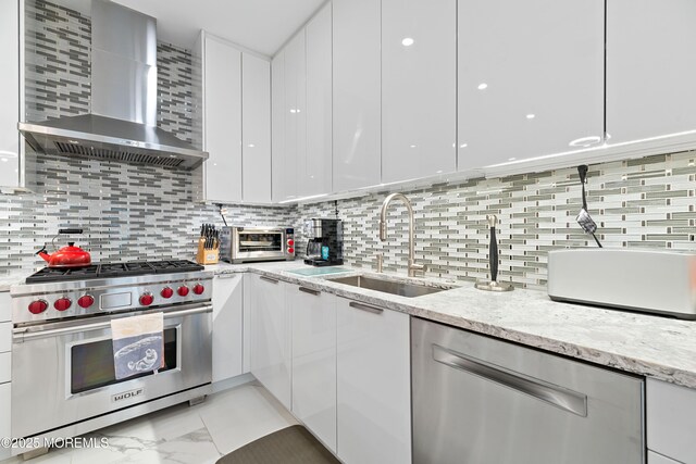 17 Riviera Dr, Long Branch, NJ 07740 - kitchen with appliances with stainless steel finishes, wall chimney range hood, modern cabinets, white cabinets, and a sink