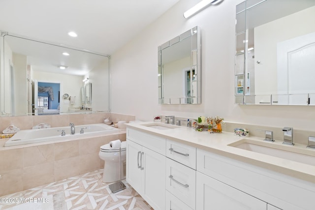 17 Riviera Dr, Long Branch, NJ 07740 - bathroom with toilet, double vanity, a garden tub, and recessed lighting