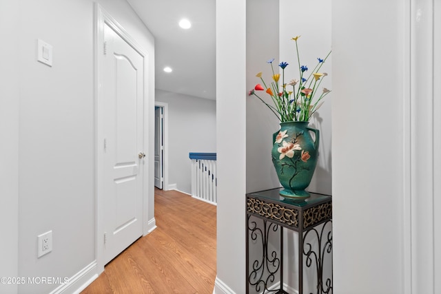 17 Riviera Dr, Long Branch, NJ 07740 - corridor featuring light wood-style flooring, recessed lighting, baseboards, and an upstairs landing